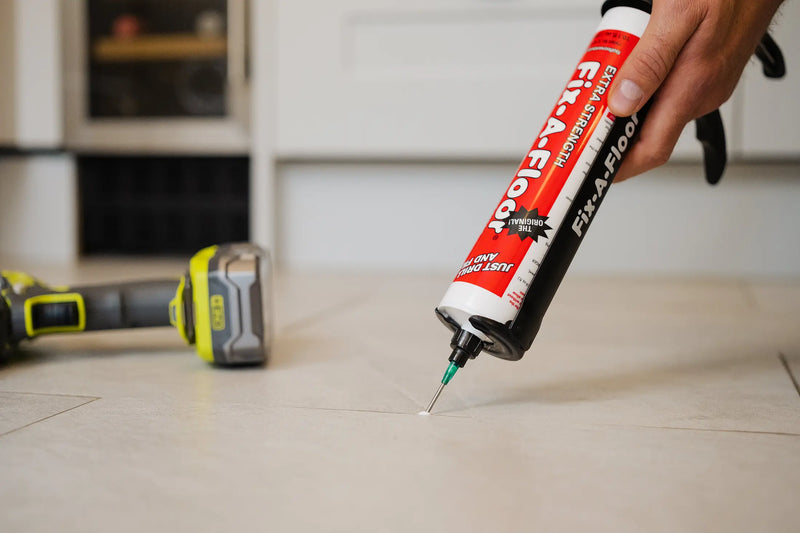 Load image into Gallery viewer, Fix-A-Floor Professional repair adhesive with precision micro injection syringe for thin gout line areas