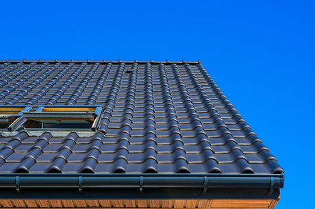 gutter sealant for waterproof roof and gutter repair on tiled house roof exterior