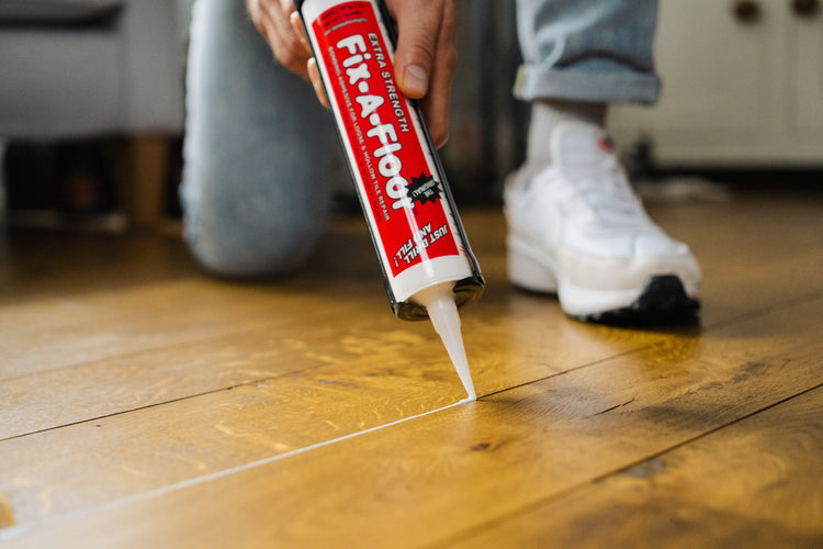 repairing gaps in wood flooring using fix-A-Floor